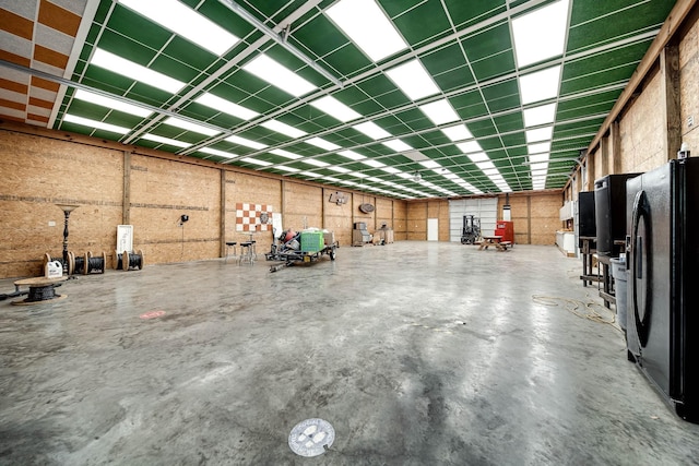 291 Bowling Branch Rd, Cottontown, TN 37048 - garage with black fridge with ice dispenser