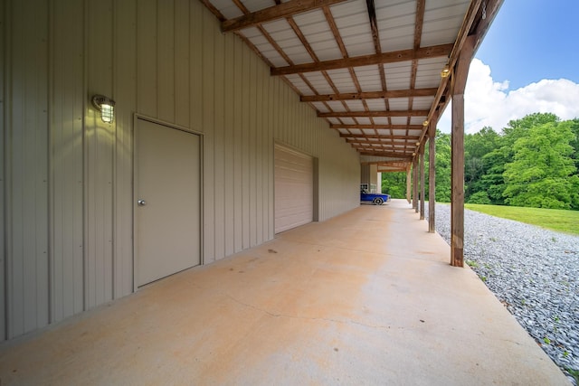 291 Bowling Branch Rd, Cottontown, TN 37048 - view of patio / terrace featuring a carport and a garage