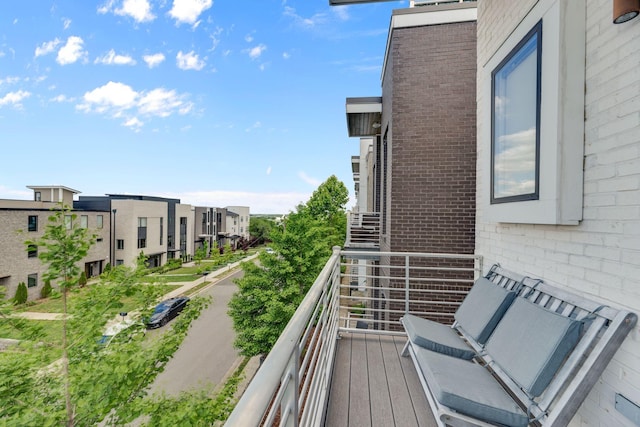 balcony featuring a residential view