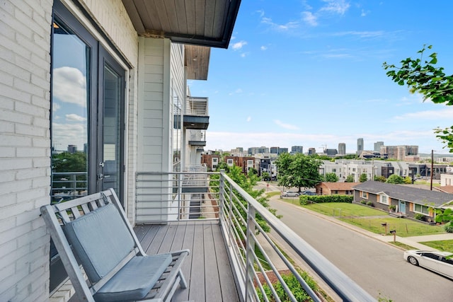 balcony featuring a city view