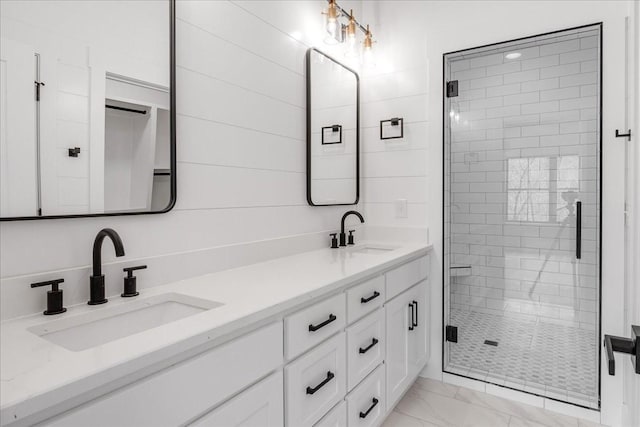113 Lake Crest Ln, Tullahoma, TN 37388 - bathroom with marble look tiles, a stall shower, and double vanity