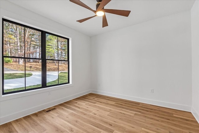 113 Lake Crest Ln, Tullahoma, TN 37388 - unfurnished room featuring baseboards, light wood-style floors, and ceiling fan