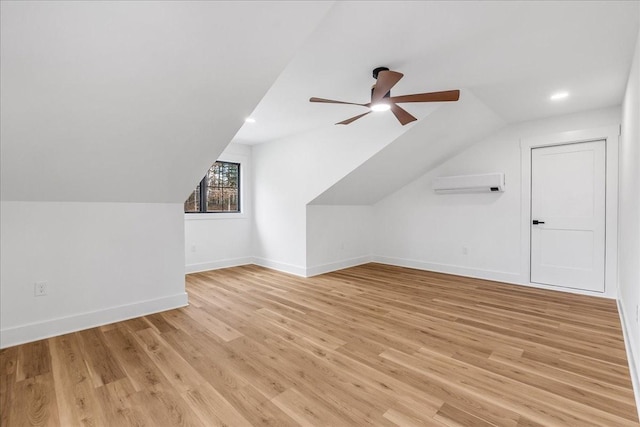 113 Lake Crest Ln, Tullahoma, TN 37388 - bonus room with a wall mounted AC, lofted ceiling, a ceiling fan, baseboards, and light wood-type flooring