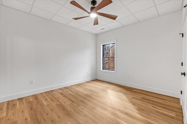 113 Lake Crest Ln, Tullahoma, TN 37388 - empty room featuring a paneled ceiling, ceiling fan, baseboards, and light wood-type flooring