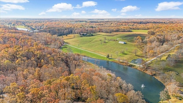 113 Lake Crest Ln, Tullahoma, TN 37388 - aerial view of property and surrounding area with a nearby body of water and a heavily wooded area