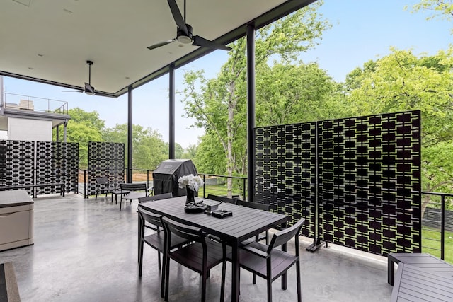 view of patio with ceiling fan, area for grilling, and outdoor dining space