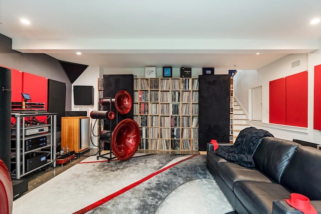 playroom with beamed ceiling and recessed lighting
