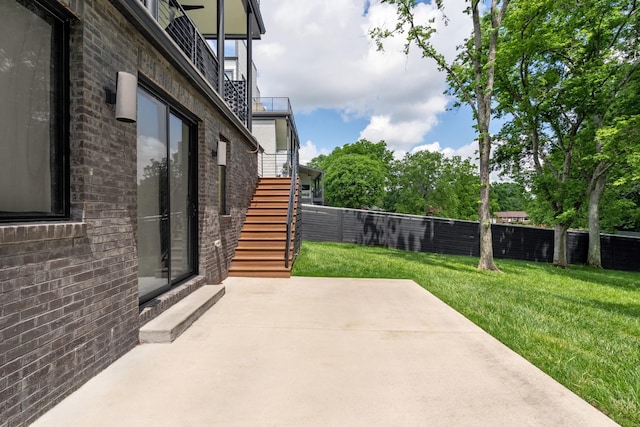view of patio / terrace featuring stairway