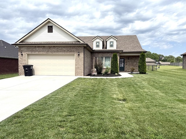 238 Spring Breeze Dr, Tullahoma, TN 37388 - view of front of home featuring brick siding, concrete driveway, a garage, and roof with shingles