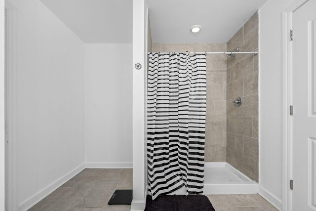 238 Spring Breeze Dr, Tullahoma, TN 37388 - full bathroom with a tile shower and baseboards