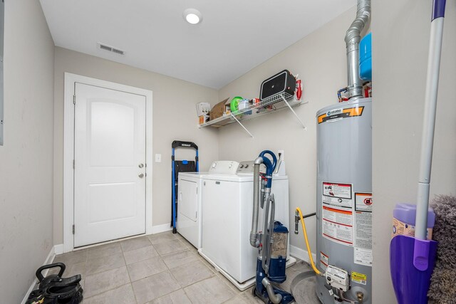 238 Spring Breeze Dr, Tullahoma, TN 37388 - laundry area with gas water heater, separate washer and dryer, baseboards, and light tile patterned flooring