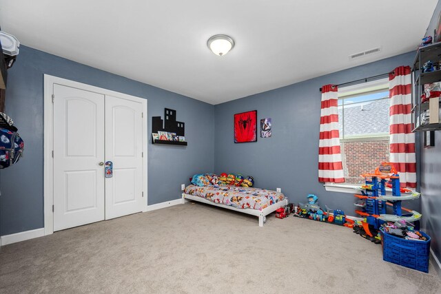 238 Spring Breeze Dr, Tullahoma, TN 37388 - bedroom with carpet floors, a closet, and baseboards
