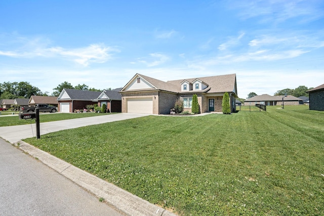 238 Spring Breeze Dr, Tullahoma, TN 37388 - view of front facade with driveway, a front lawn, a garage, and brick siding