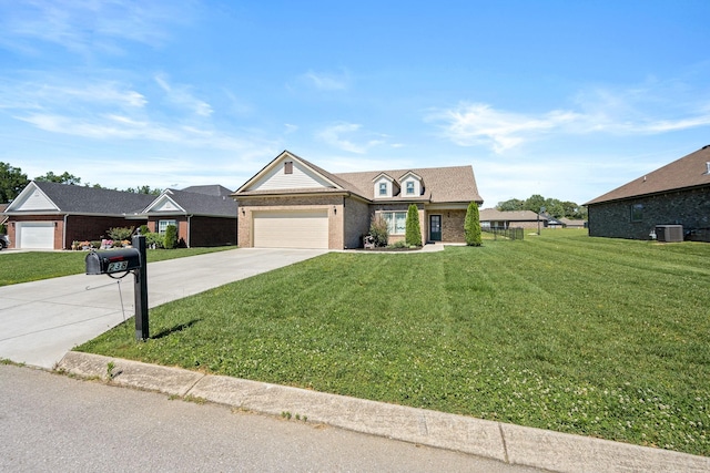 238 Spring Breeze Dr, Tullahoma, TN 37388 - view of front of property featuring brick siding, driveway, central AC, and a front yard