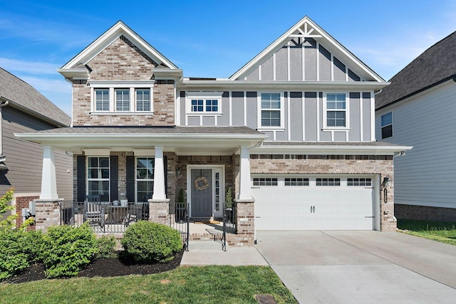 1125 Clendening Dr, Gallatin, TN 37066 - craftsman-style house with a porch, board and batten siding, a garage, driveway, and brick siding