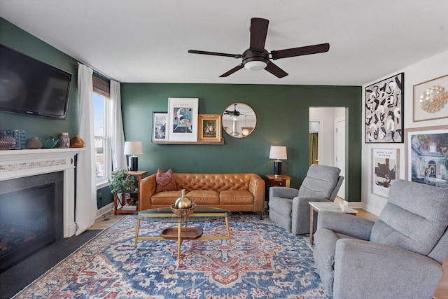 1125 Clendening Dr, Gallatin, TN 37066 - living area with ceiling fan, a fireplace with flush hearth, and baseboards