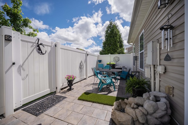 view of patio / terrace with a fenced backyard and outdoor dining space