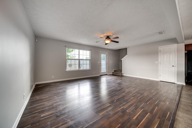 4838 Laura Jeanne Blvd, Murfreesboro, TN 37129 - unfurnished living room featuring baseboards, ceiling fan, dark wood-style flooring, a textured ceiling, and stairs