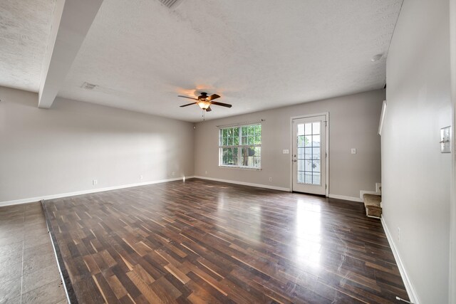 4838 Laura Jeanne Blvd, Murfreesboro, TN 37129 - unfurnished living room featuring ceiling fan, wood finished floors, a textured ceiling, and baseboards