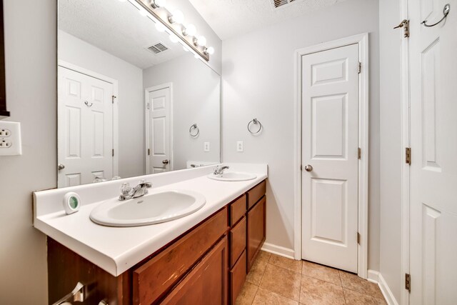 4838 Laura Jeanne Blvd, Murfreesboro, TN 37129 - full bath with double vanity, tile patterned flooring, and baseboards