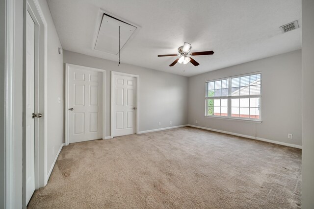 4838 Laura Jeanne Blvd, Murfreesboro, TN 37129 - unfurnished bedroom featuring attic access, carpet flooring, baseboards, and a ceiling fan