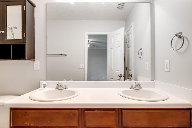 4838 Laura Jeanne Blvd, Murfreesboro, TN 37129 - bathroom with double vanity, a ceiling fan, and a textured ceiling