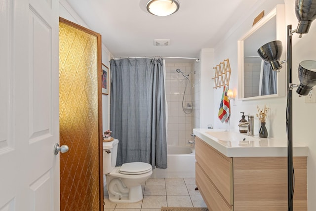 bathroom with tile patterned flooring, toilet, vanity, and shower / bathtub combination with curtain