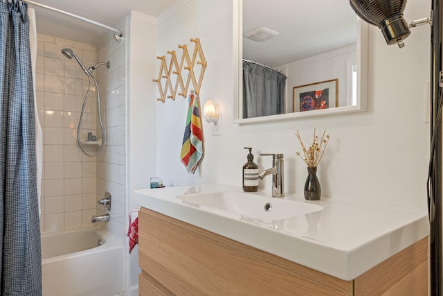 bathroom featuring shower / bathtub combination with curtain and vanity