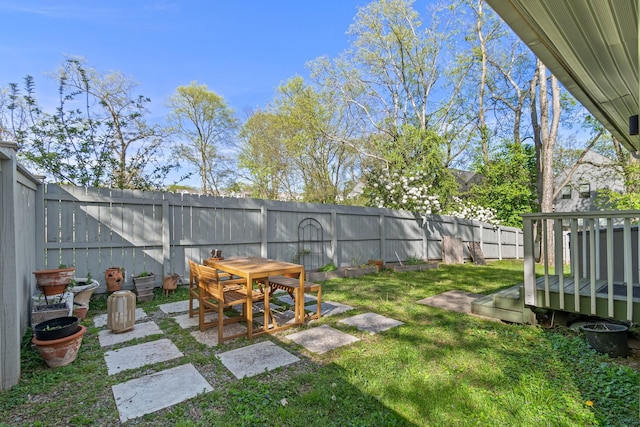 view of yard with a deck