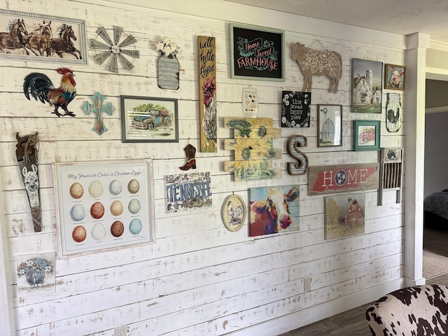 287 Sisk Rd, Winchester, TN 37398 - detailed view of wooden walls, a textured ceiling, and wood finished floors