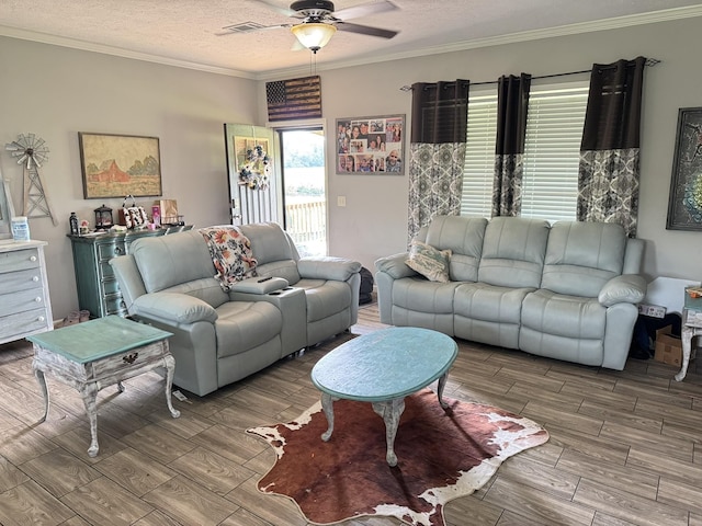 287 Sisk Rd, Winchester, TN 37398 - living area with a ceiling fan, wood finished floors, ornamental molding, and a textured ceiling