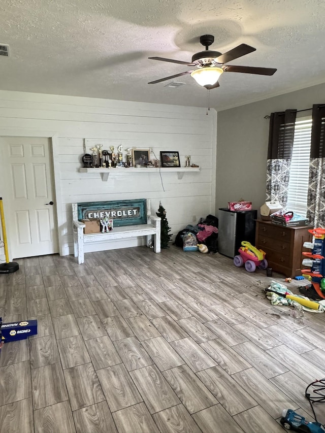 287 Sisk Rd, Winchester, TN 37398 - living area featuring a textured ceiling, wood tiled floors, and ceiling fan