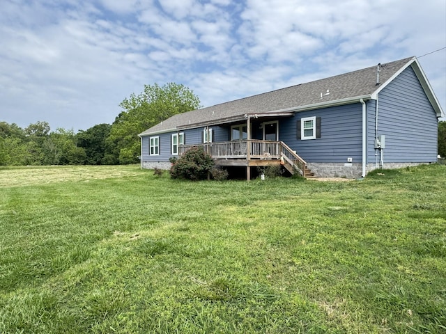 287 Sisk Rd, Winchester, TN 37398 - back of property with a yard, a wooden deck, and roof with shingles