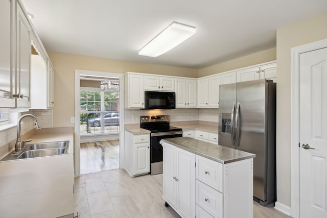 1403 Ottawa Pl, Murfreesboro, TN 37129 - kitchen with stainless steel appliances, a sink, white cabinets, and tasteful backsplash