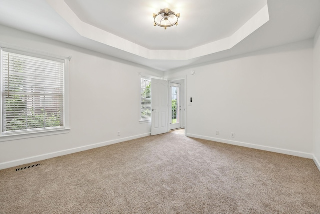 1403 Ottawa Pl, Murfreesboro, TN 37129 - carpeted spare room with a tray ceiling and baseboards