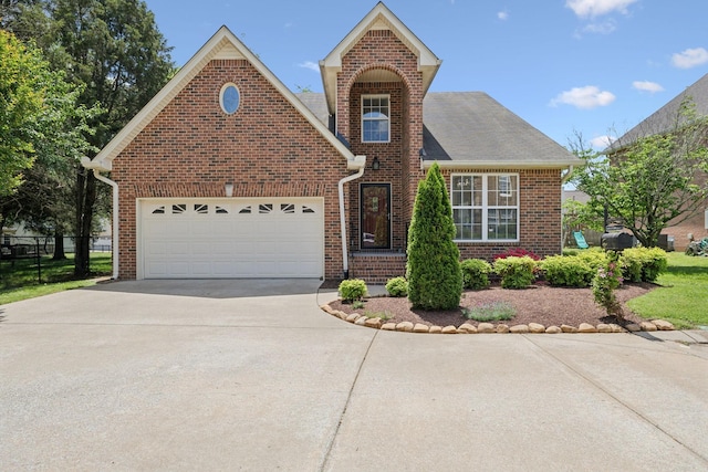 1403 Ottawa Pl, Murfreesboro, TN 37129 - traditional-style house with concrete driveway, brick siding, a garage, and roof with shingles