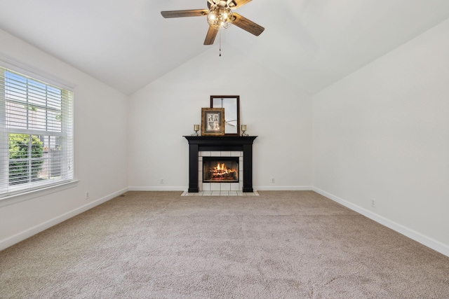 1403 Ottawa Pl, Murfreesboro, TN 37129 - unfurnished living room featuring a tiled fireplace, lofted ceiling, ceiling fan, light carpet, and baseboards