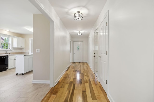 1403 Ottawa Pl, Murfreesboro, TN 37129 - hall with light wood-type flooring, baseboards, and a sink