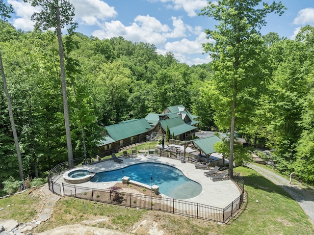 3560 Tyree Springs Rd, Hendersonville, TN 37075 - view of pool with fence, a pool with connected hot tub, a forest view, and a patio area