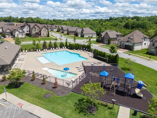 community pool with a residential view