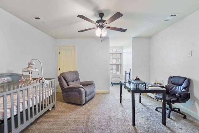 carpeted bedroom featuring baseboards and ceiling fan