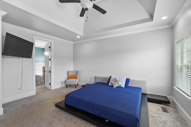 carpeted bedroom featuring ornamental molding, recessed lighting, baseboards, ensuite bath, and ceiling fan