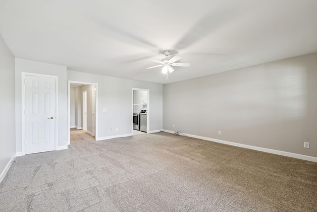 unfurnished living room featuring ceiling fan, light colored carpet, and baseboards