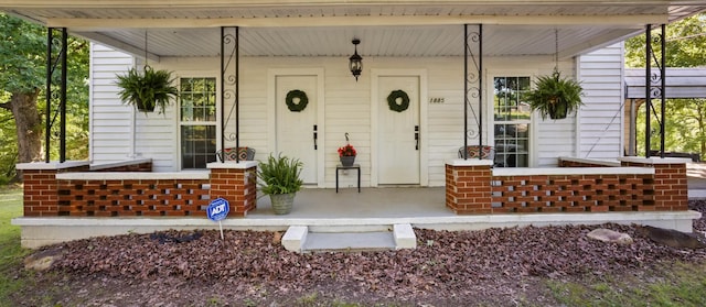 1885 N Soules Chapel Rd, Cunningham, TN 37052 - view of exterior entry featuring covered porch