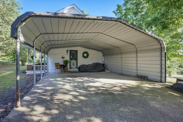 1885 N Soules Chapel Rd, Cunningham, TN 37052 - view of parking with a detached carport and asphalt driveway