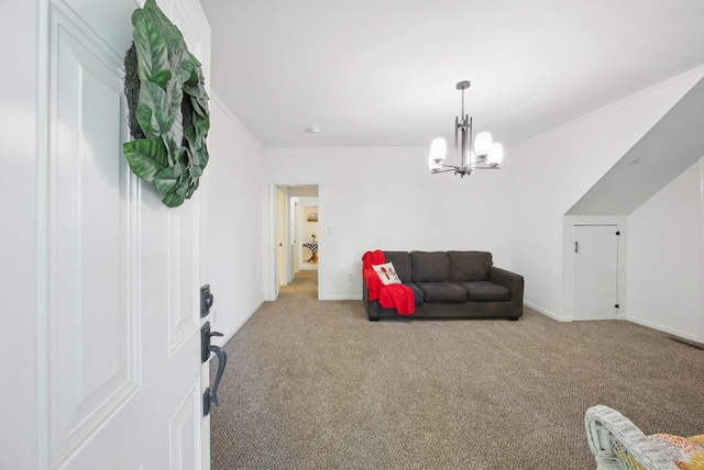 1885 N Soules Chapel Rd, Cunningham, TN 37052 - living area featuring carpet floors, ornamental molding, a chandelier, and baseboards