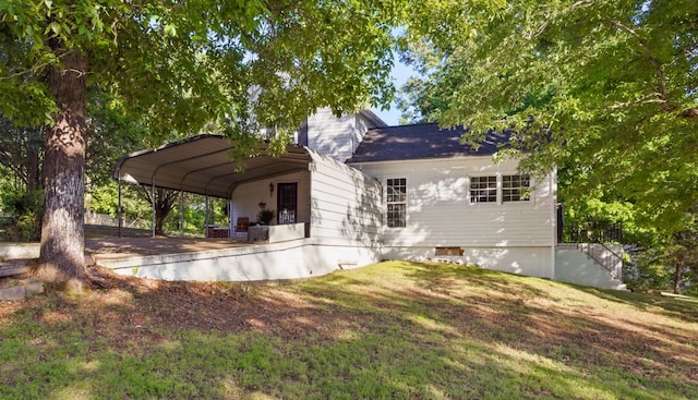 1885 N Soules Chapel Rd, Cunningham, TN 37052 - back of property with a yard and a carport