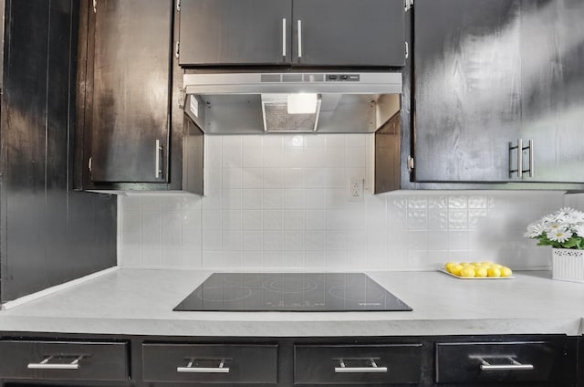 1885 N Soules Chapel Rd, Cunningham, TN 37052 - kitchen with black electric cooktop, light countertops, ventilation hood, and backsplash