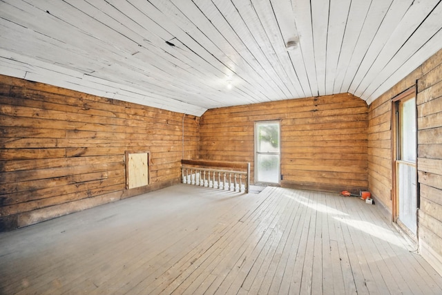 1885 N Soules Chapel Rd, Cunningham, TN 37052 - empty room with vaulted ceiling, hardwood / wood-style flooring, and wood walls