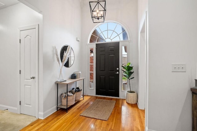 2184 Loudenslager Dr, Thompsons Station, TN 37179 - entryway with light wood-style flooring, a chandelier, and baseboards